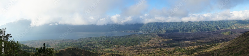Panoramic view of a lake surrounded by mountain,  Danau Batur, Gunung Batur, Kintamani, in Bali island, Indonesia. 