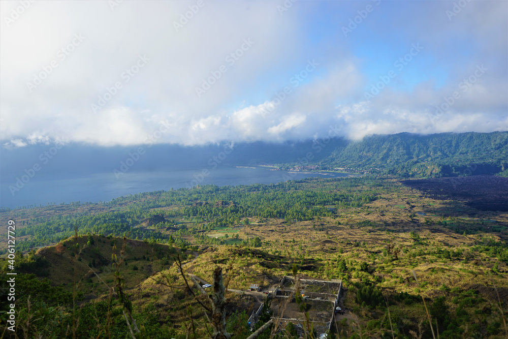 Panoramic view of a lake surrounded by mountain,  Danau Batur, Gunung Batur, Kintamani, in Bali island, Indonesia. 
