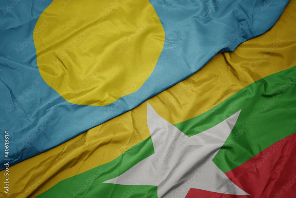 waving colorful flag of myanmar and national flag of Palau . waving colorful flag of myanmar and national flag of Palau .
