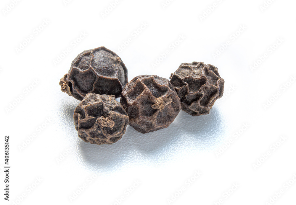 close up macro shot Black peppercorns (Black pepper) isolated on white background. close up macro shot Black peppercorns (Black pepper) isolated on white background.