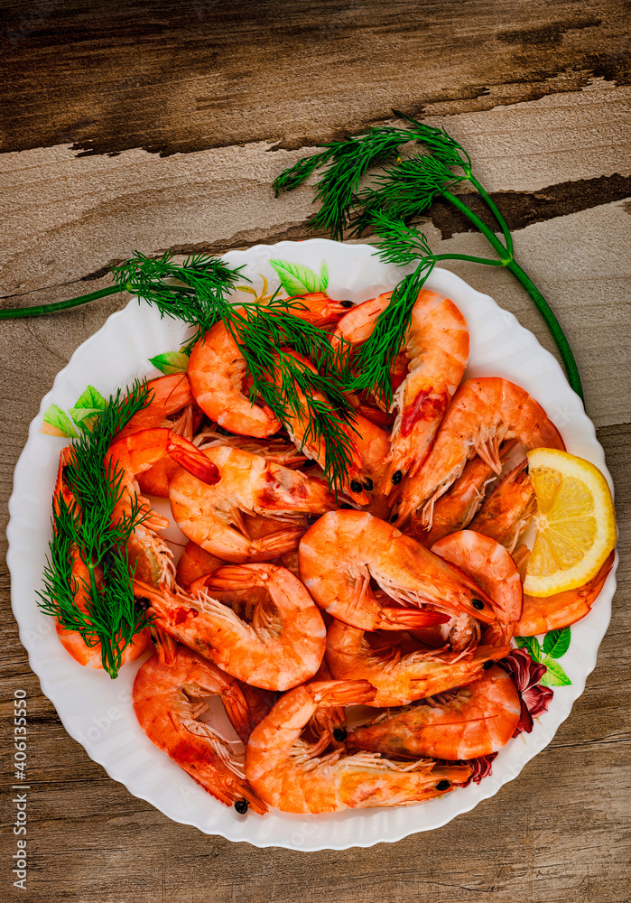 fried shrimp on a plate with a piece of lemon fried shrimp on a plate with a piece of lemon