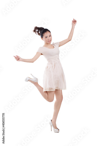 Portrait of a Young woman jumping smiling