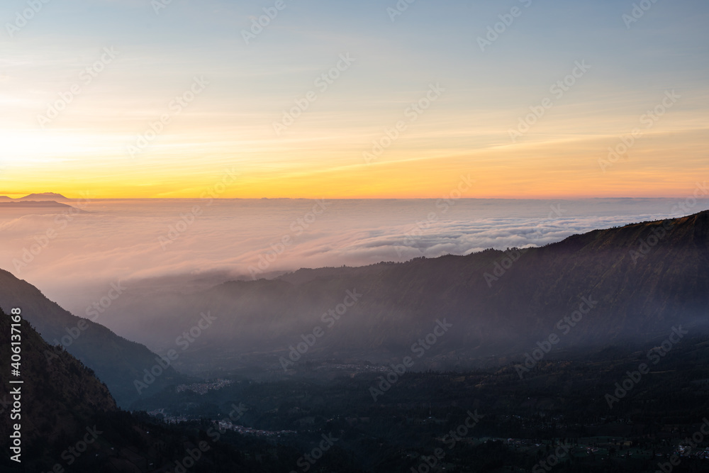 Beautiful sunrise over sea of fog at Mount Bromo in Bromo Tengger Semeru National Park, East Java, Indonesia