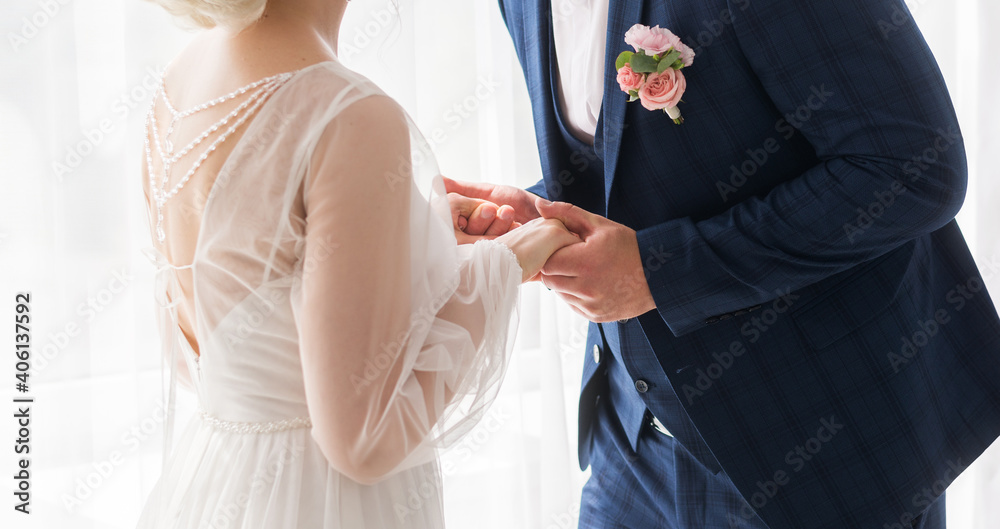 wedding theme, holding hands newlyweds. the bride and groom hold hands wedding theme, holding hands newlyweds. the bride and groom hold hands