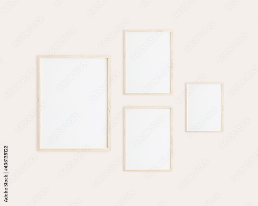 Gallery frame mockup, 4 vertical wooden frames on wall to showcase wall art. Gallery frame mockup, 4 vertical wooden frames on wall to showcase wall art.