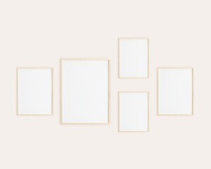 Gallery wall mockup, five empty vertical frames on wall for design presentation, wall art exhibition.