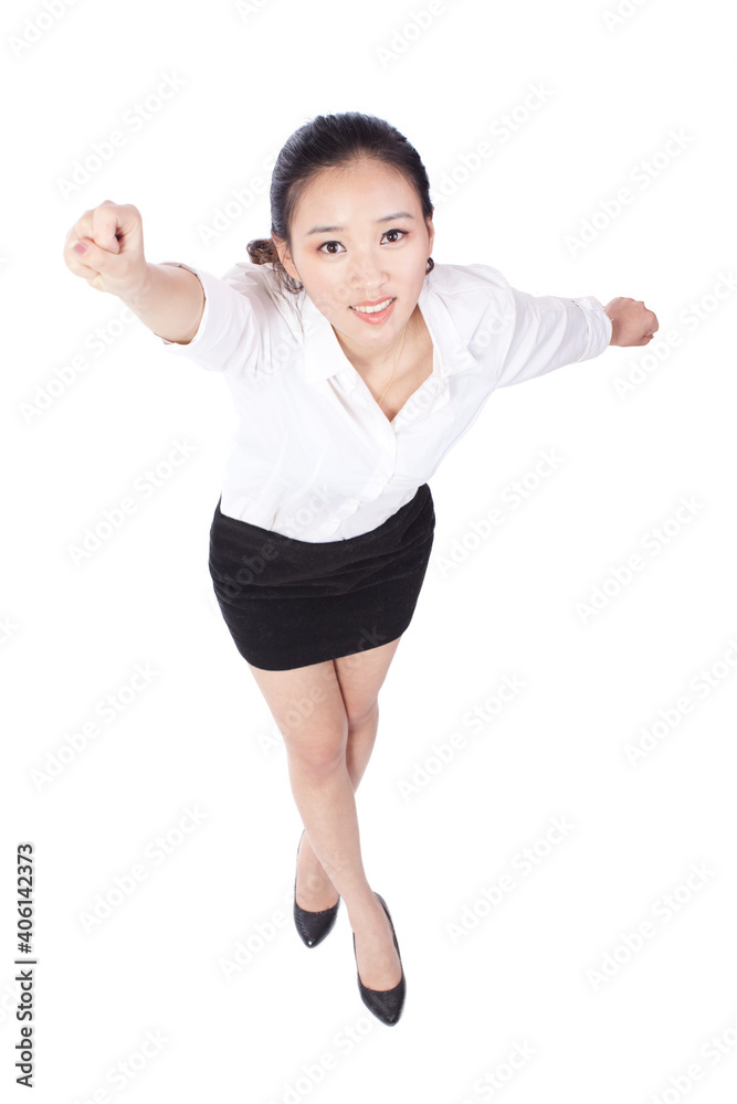 Young business woman clenching fists and smiling Young business woman clenching fists and smiling