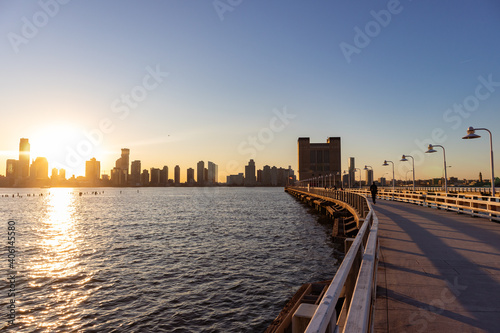 Photography Pier 34 along the Hudson River in New York City with a Sunset over the Jersey Ci