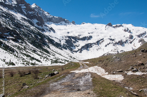 Parque nacional de Ordesa y Monteperdido. Valle de Otal. Senderismo en los pirineos en una paisaje alpino nevado photo