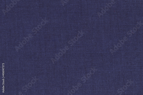 The texture of dark blue fabric for clothing.