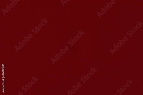 Clean red retro paper background. Vintage cardboard texture. Grunge paper for drawing. Simple blank fabric pattern.