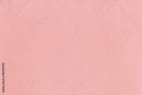 Clean red retro paper background. Vintage cardboard texture. Grunge paper for drawing. Simple blank fabric pattern.