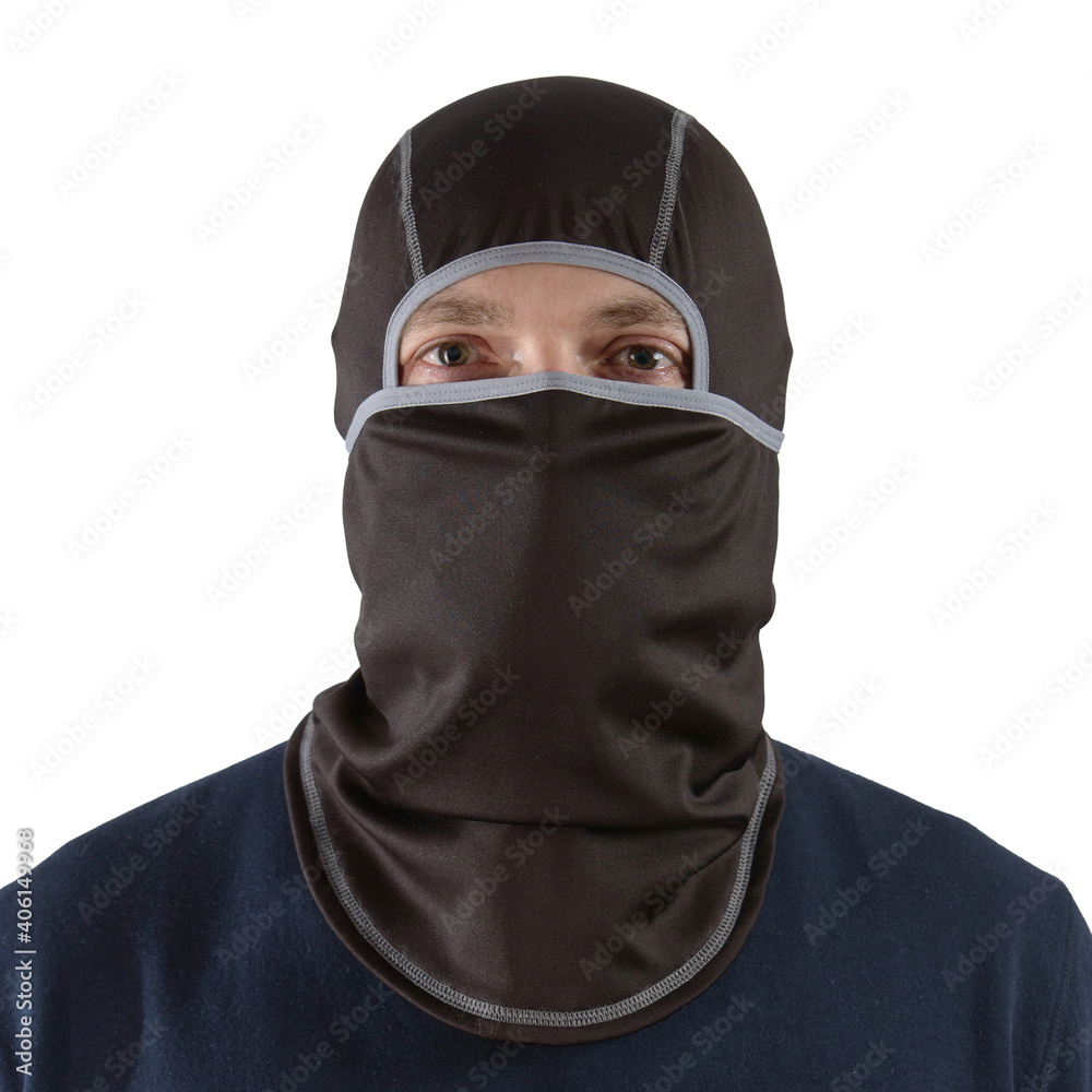 brunette man in a blue shirt with a black balaclava with gray edging brunette man in a blue shirt with a black balaclava with gray edging