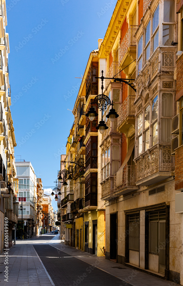 Picturesque view of old houses and streets of Cartagena town at sunny summer day, Spain