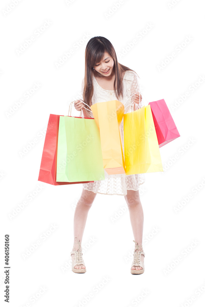 Portrait of a happy young woman shopping Portrait of a happy young woman shopping