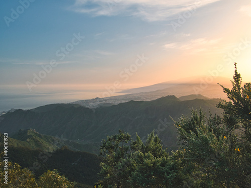 Scenic View Of Mountains Against Sky During Sunset