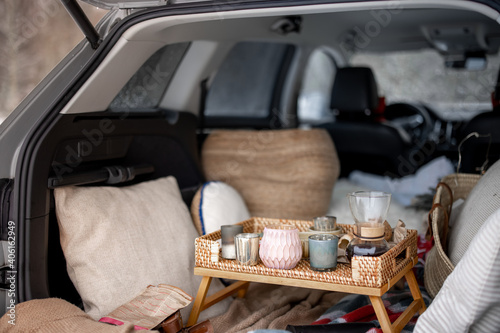 A cozy picnic in car trunk during winter photo