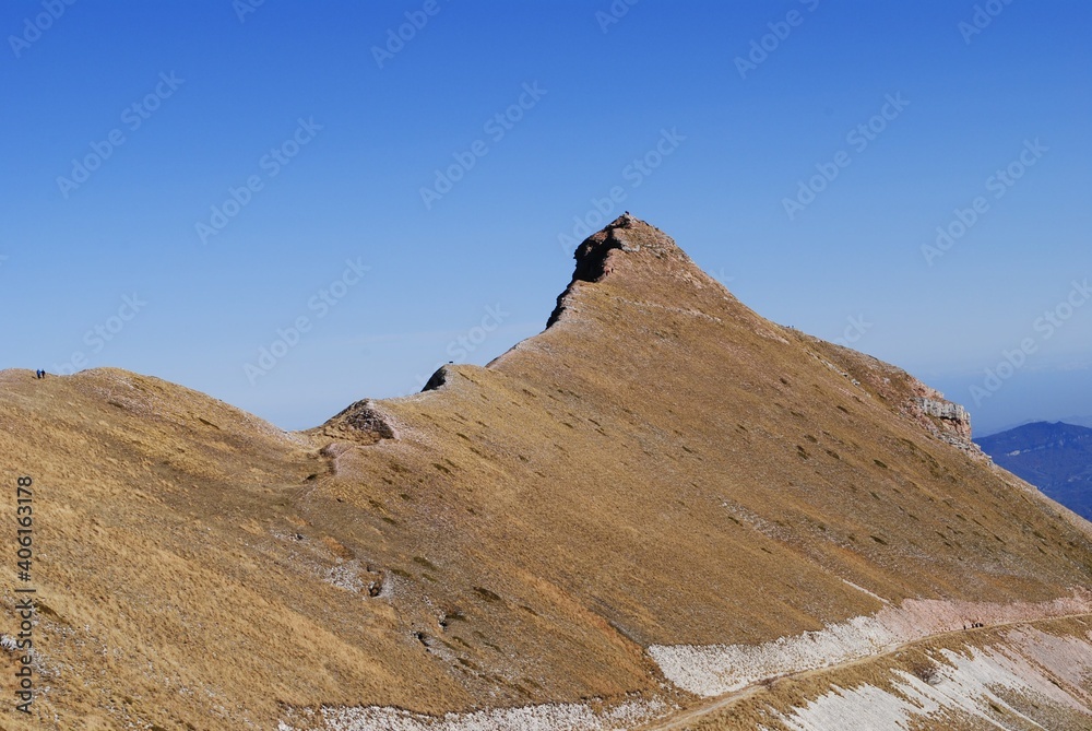 person on the top of the mountain person on the top of the mountain