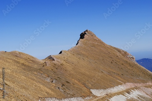 person on the top of the mountain