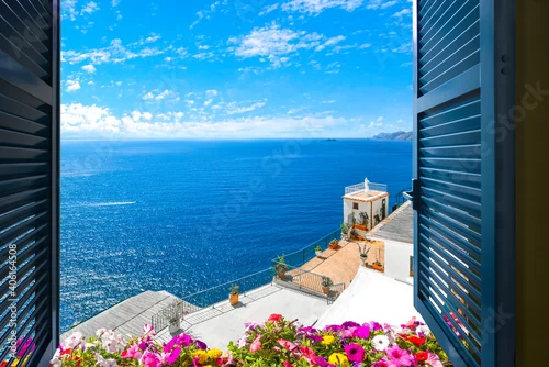 Fototapeta Scenic open window view of the Mediterranean Sea from a room along the Amalfi Coast near Sorrento, Italy