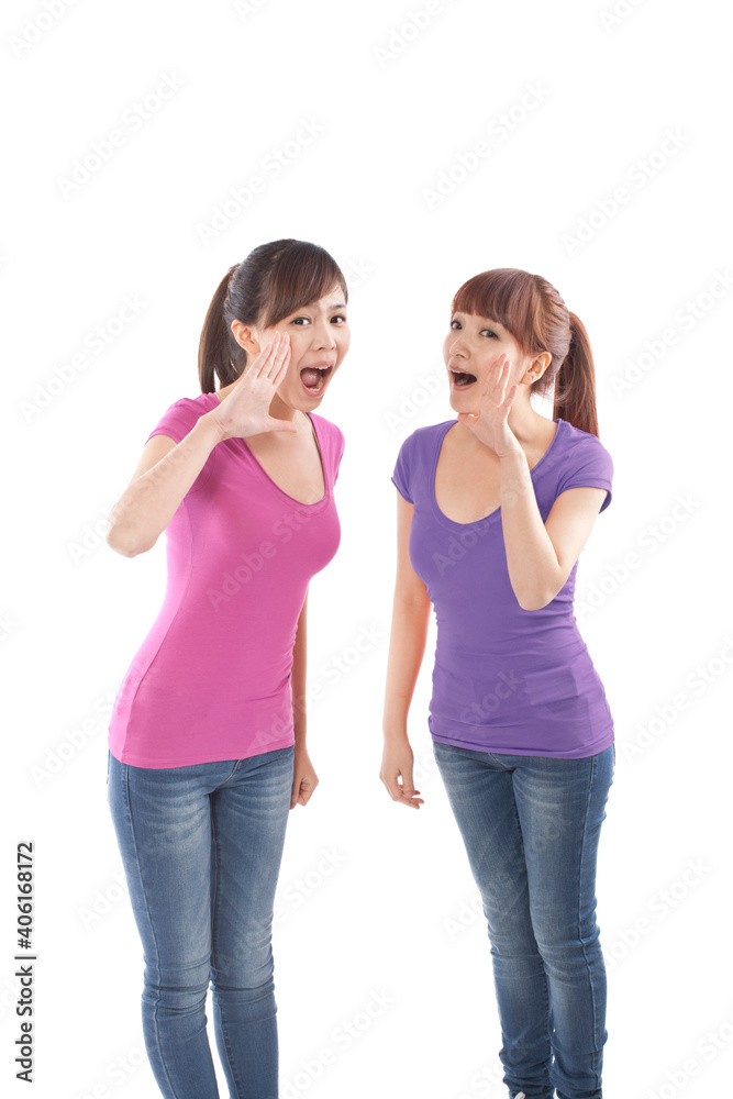 Portrait of two young female friends yelling Portrait of two young female friends yelling