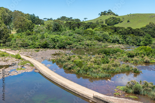 Blang dam with Cai river and forest photo