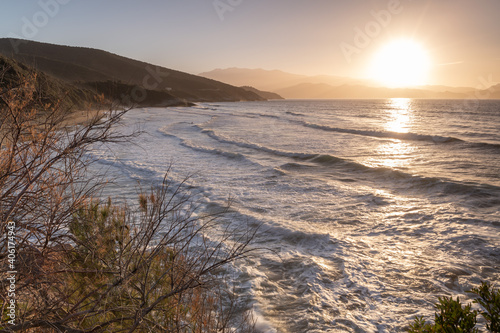 Golden hour over a rough sea. Farinole, Corsica