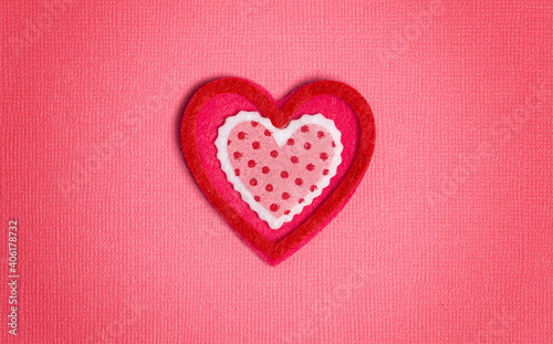 Simple Background with Felt Love Hearts on Pink Background
