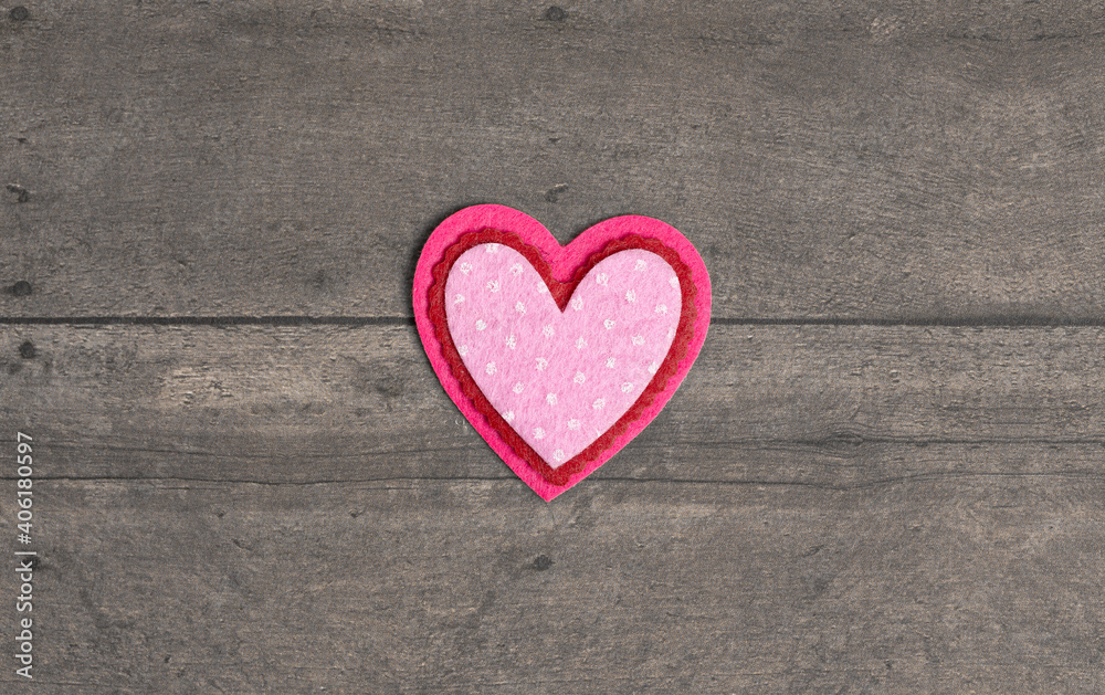 Simple Background with Felt Love Hearts on a Wood Table Simple Background with Felt Love Hearts on a Wood Table