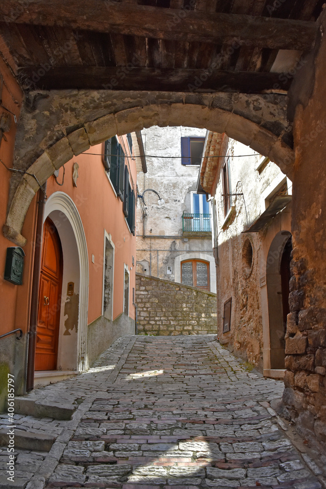 An entrance arch in one of the alleys in the medieval town of Morcone in the province of Benevento.