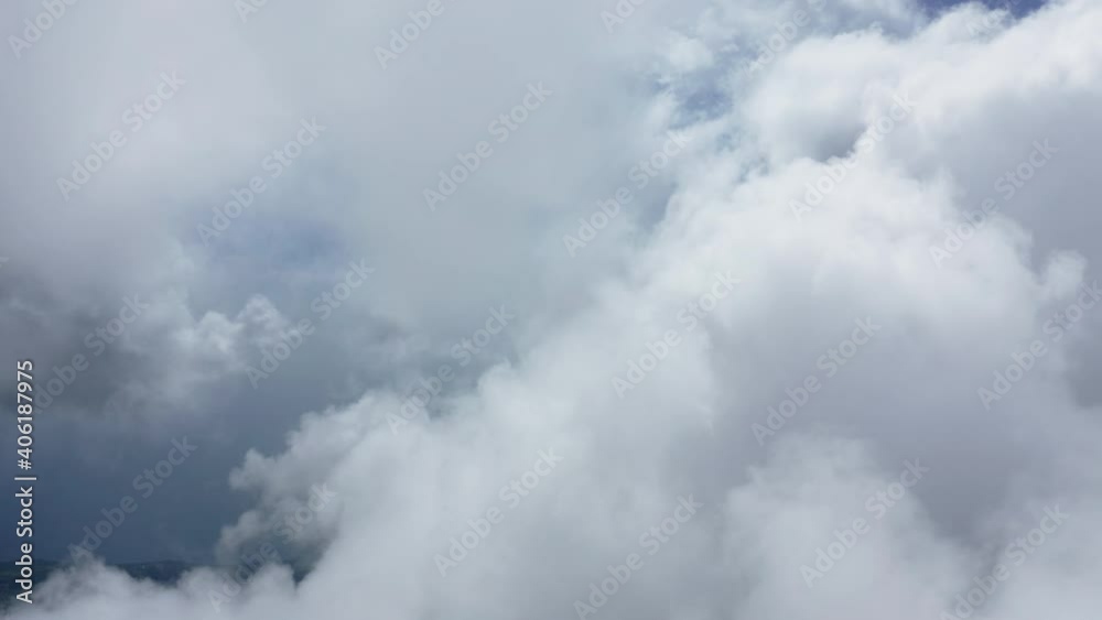 Flying around through the clouds by the Mount Pelee volcano in Martinique. Caribbean island. Sunny noon with clouds. Aerial shot, 4K Flying around through the clouds by the Mount Pelee volcano in Martinique. Caribbean island. Sunny noon with clouds. Aerial shot, 4K