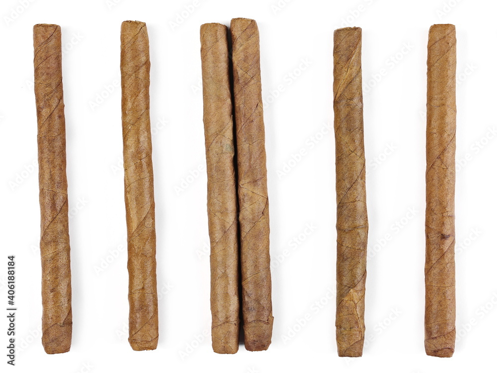 Set luxury handmade cigars isolated on white background, top view Set luxury handmade cigars isolated on white background, top view