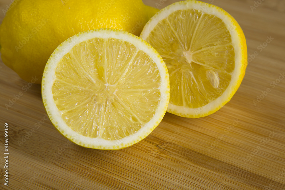 Lemons are yellow on a wooden background. Citrus fruits. Lemons are yellow on a wooden background. Citrus fruits.