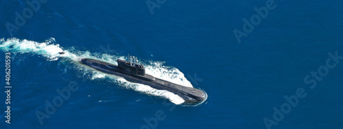 Aerial drone ultra wide panoramic photo of latest technology armed diesel powered submarine cruising half submerged deep blue sea  © aerial-drone