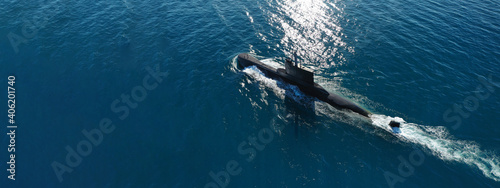 Aerial drone ultra wide panoramic photo of latest technology navy armed diesel powered submarine cruising half submerged deep blue sea photo