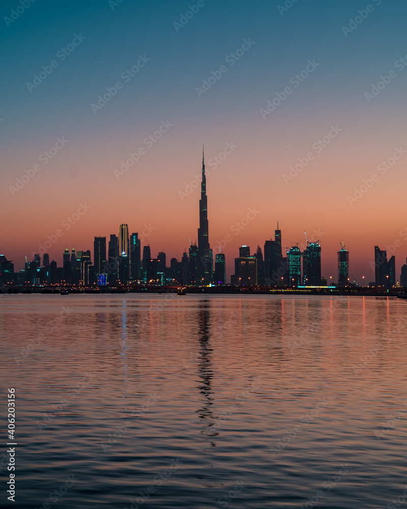 Sunset over Dubai Skyline.