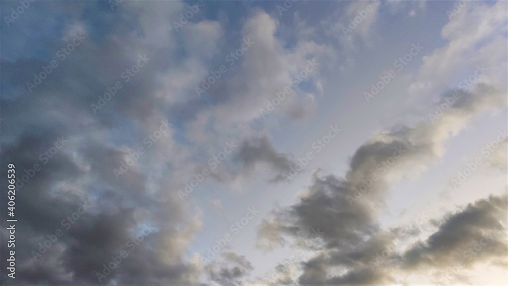 Fototapeta premium evening sky with white and gray clouds.