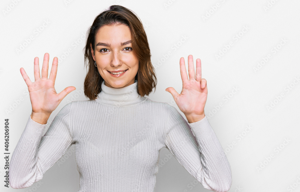 Young caucasian girl wearing casual clothes showing and pointing up with fingers number nine while smiling confident and happy. Young caucasian girl wearing casual clothes showing and pointing up with fingers number nine while smiling confident and happy.