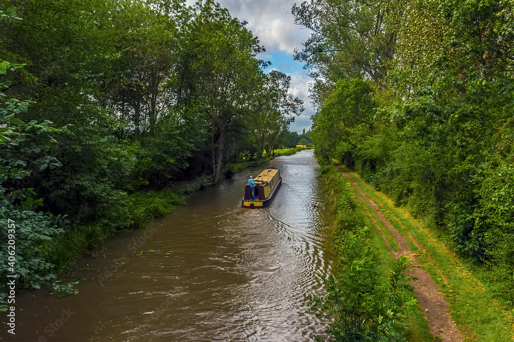 A view of down the Grand Union Canal near Wistow, UK in summertime A view of down the Grand Union Canal near Wistow, UK in summertime