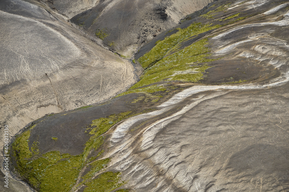 Fototapeta premium Pumice sand patterns by Næfurholtsfjöll and Sauðafell, close to Volcano Hekla, Central Highlands of Iceland.