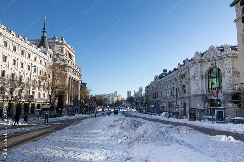 Calle Alcalá in Madrid covered by snow and cold from the storm Filomena. Great snowfall in Madrid. Snow storm.