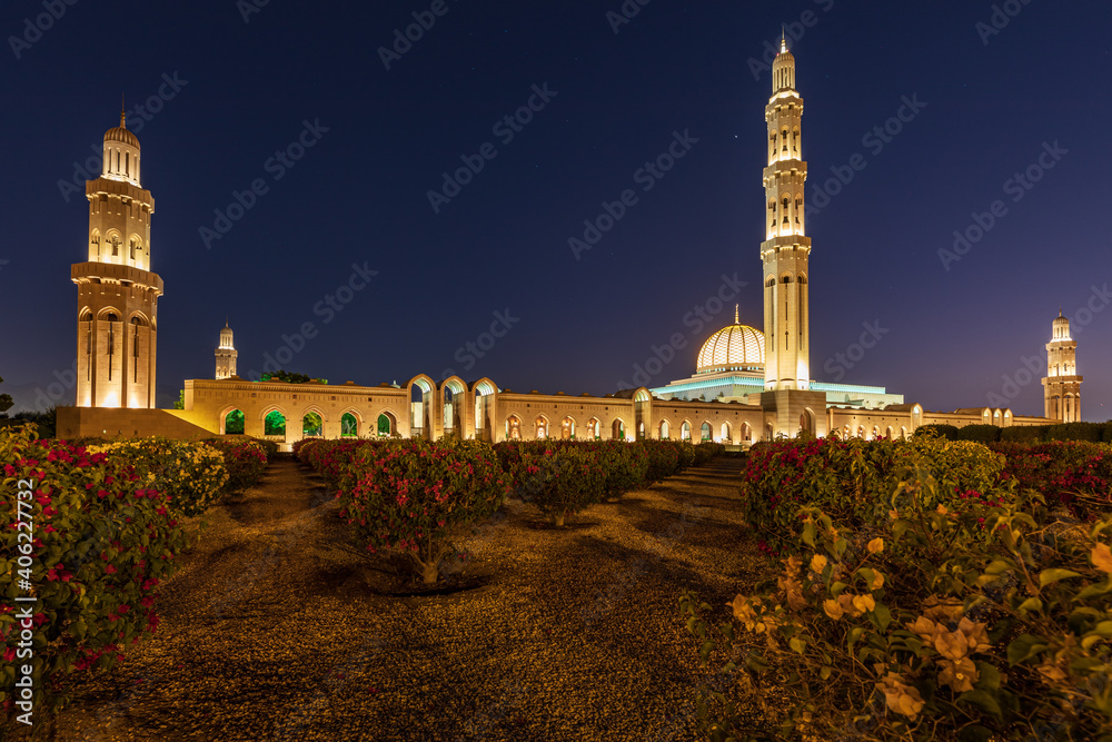 Night time view of the Sultan Qaboos Grand Mosque in Bawshar, Muscat.