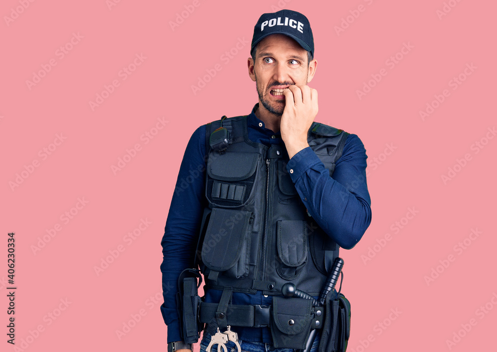 Young handsome man wearing police uniform looking stressed and nervous with hands on mouth biting nails. anxiety problem. Young handsome man wearing police uniform looking stressed and nervous with hands on mouth biting nails. anxiety problem.