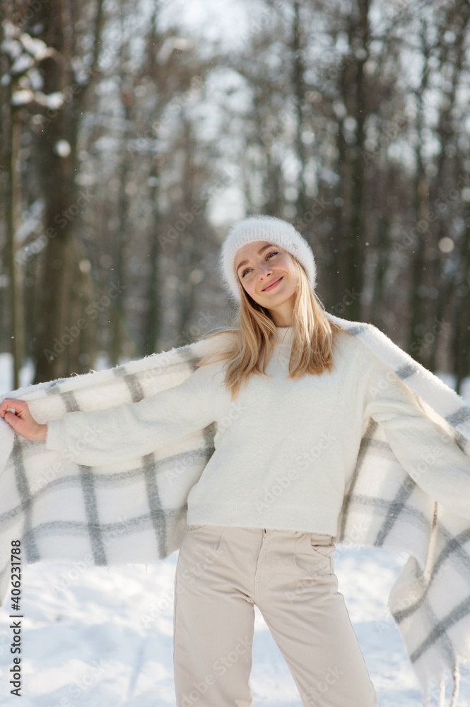 Cute young woman portrait, winter outdoor relaxation Cute young woman portrait, winter outdoor relaxation