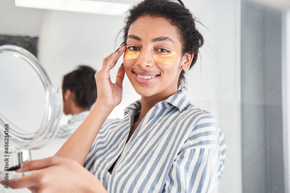 Woman spending time at the bathroom at morning Woman spending time at the bathroom at morning