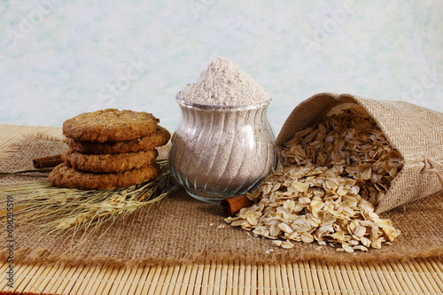 healthy wholegrain organic oatmeal flour,oatmeal cookie,rolled oatmeal flakes photo