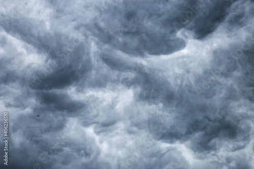 Dark cloudy sky before thunderstorm background. Storm heaven clouds in sky. W...