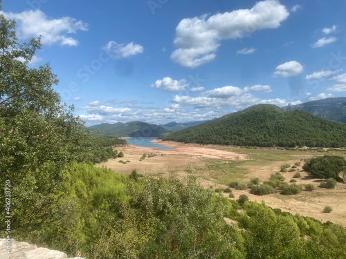 Fototapeta Naklejka Na Ścianę i Meble -  view of the Tranco reservoir located in the Sierras de Cazorla, Segura y las Villas Natural Park in Jaen, Spain