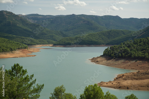 view of the Tranco reservoir located in the Sierras de Cazorla, Segura y las Villas Natural Park in Jaen, Spain