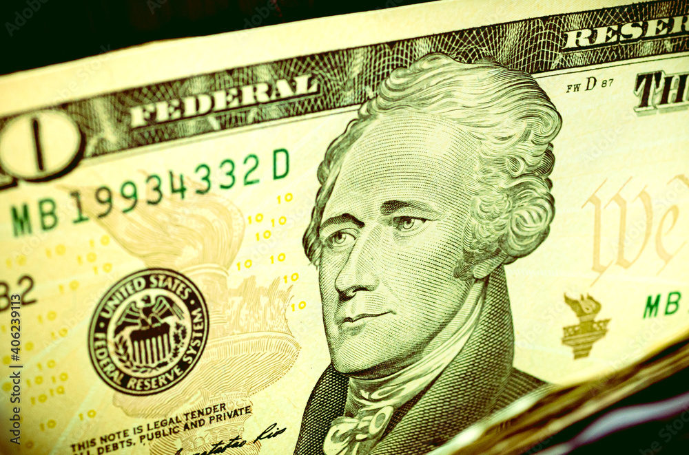 Ten dollar bill of the United States of America in an improvised piggy